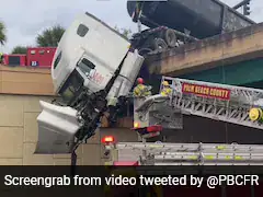 Caught On Camera: US Firefighters Rescue Driver From Dangling Truck