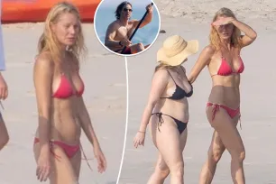 Gwyneth Paltrow flaunts washboard abs in hot pink bikini while vacationing with husband, kids in Mexico