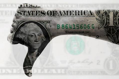 Dollar about to mark yearly loss on Fed's outlook