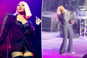 Singer Monica appears to faint during Houston concert