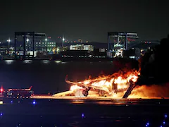 "Miracle" Evacuation From Burning Japan Jet Helped By Fliers Leaving Bags