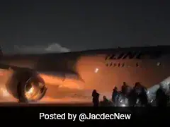 Video: Passengers Slide Down From Burning Plane In Japan