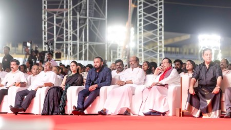 Rajinikanth in white and Kamal Haasan in black at Kalaingar 100. See pics