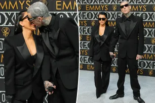 Kourtney Kardashian and Travis Barker make out in matching black suits on the Emmys 2024 red carpet