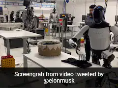 Elon Musk Shares Video Of Tesla's Optimus Robot Folding Shirts, But Issues Clarification Later