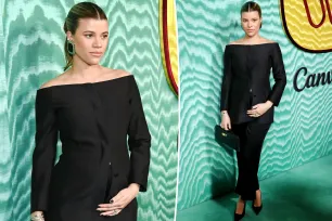 Pregnant Sofia Richie shows off baby bump on the red carpet for first time in off-the-shoulder suit