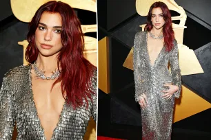 Dua Lipa sparkles on the Grammys 2024 red carpet in a low-cut silver gown