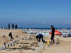 Forced To Live "Among The Dead": Displaced Gazans Seek Shelter In Cemetery