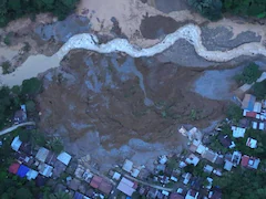 'Miracle' Rescue Of Child Nearly 60 Hours After Philippine Landslide