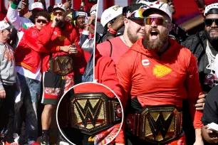 Travis Kelce rocks custom WWE wrestling belt at Kansas City Chiefs Super Bowl parade