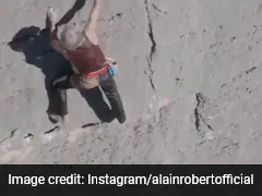 60-Year-Old "French Spiderman" Climbs Mountain Without Safety Gear