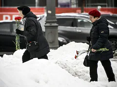 Putin Critic Alexei Navalny Tributes Paid At Moscow's 'Wall Of Grief'