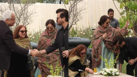 Anil Kapoor greets Kirron Kher by touching her feet at lunch hosted by Abhinav Bindra. See pics