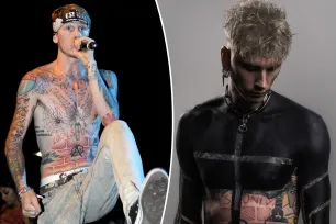 Machine Gun Kelly shows off wild new blackout tattoos covering his arms, chest and torso