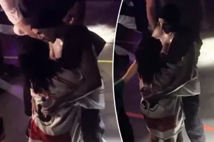 Kourtney Kardashian and Travis Barker make out backstage at his Blink-182 concert in Sydney