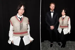 Billie Eilish keeps her schoolgirl streak going in sweater vest on the SAG Awards 2024 red carpet