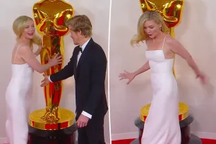 Kirsten Dunst trips over giant Oscar statue while walking 2024 red carpet with husband Jesse Plemons