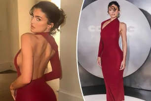 Kylie Jenner shows some skin in backless red gown for perfume launch