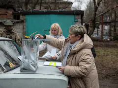 Russia Begins Voting As Ukraine Steps Up Border Attacks