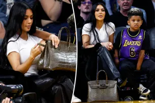 Kim Kardashian sends fans into dismay after callously placing her $40K Birkin bag on the floor during courtside basketball game