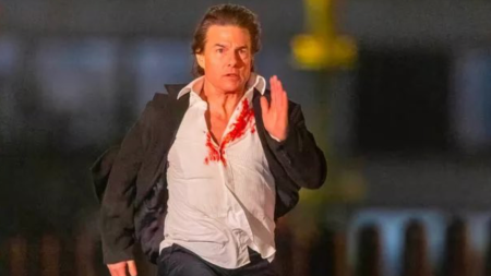 Tom Cruise runs in a blood-soaked shirt as he shoots for Mission Impossible 8 in London. See pics, video