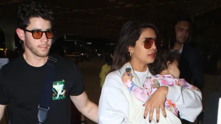 Nick Jonas requests paps not to make noise as Priyanka Chopra and Malti get down from car at airport, trio bids goodbye to India. Watch