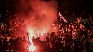 Israelis rally in their largest anti-government protest since the war in Gaza began