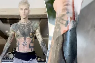 Machine Gun Kelly shares bloody behind-the-scenes look at blackout tattoo process