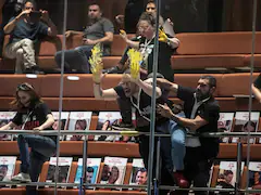 Protestors Seeking Hostages' Release Smear Paint In Israeli Parliament