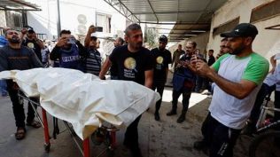 Bodies of 6 foreign aid workers slain in Israeli strikes transported out of Gaza