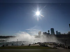 As Solar Eclipse Begins, Thousands Gather At North American Resort