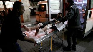 Israeli settlers rampage through a West Bank village, killing 1 Palestinian and wounding 25