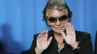 Italian fashion designer Roberto Cavalli has died at age 83, his company says