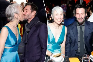 Keanu Reeves kisses Alexandra Grant with his eyes open – again – during rare red carpet date night