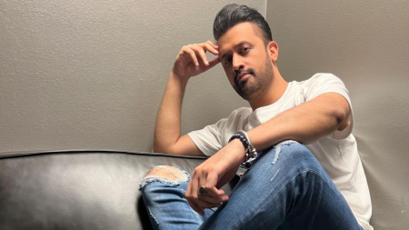 Emotional fan jumps on stage, hugs Atif Aslam during live concert; singer’s response wins internet’s heart. Watch