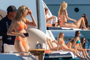 Brittany Mahomes sports tiny orange bikini on boat trip with her gal pals