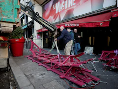 Paris Landmark Moulin Rouge's Windmill Sails Collapse