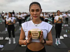 "Feel Like A Beautiful Bird": Mass Yoga Session At Bangkok Airport Runway