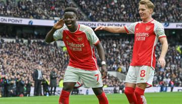 English Premier League: Arsenal hold off Spurs in north London derby to maintain lead