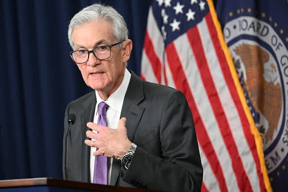 Fed keeps rates steady as it notes 'lack of further progress' on inflation