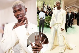 Blond Lil Nas X sports glittering jumpsuit on the 2024 Met Gala red carpet