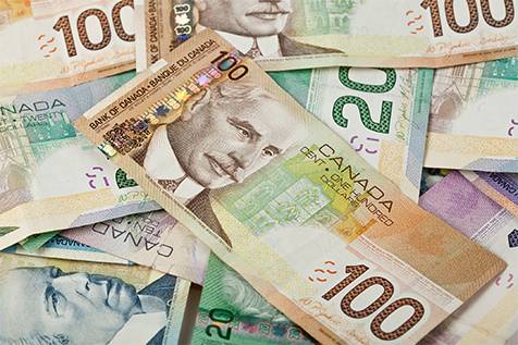 Loonie edges up after monthly employment data