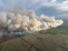 Canadian Town Threatened By Wildfire Likely To Avoid Direct Hit