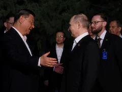 Putin And Xi Exchange Rare Hugs, Cementing Strategic Partnership