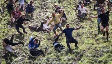 Annual Cooper's Hill cheese chase brings downhill daredevils to Gloucestershire