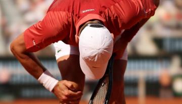 Tennis: Top seed Novak Djokovic overcomes injury scare to reach French Open quarter-finals over Argentine Francisco Cerundolo