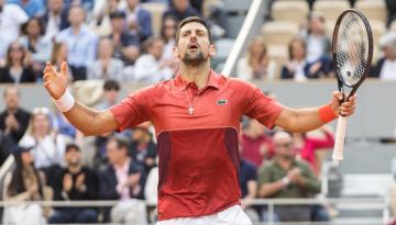 Tennis: World number one Novak Djokovic pulls out of French Open quarter finals with knee injury