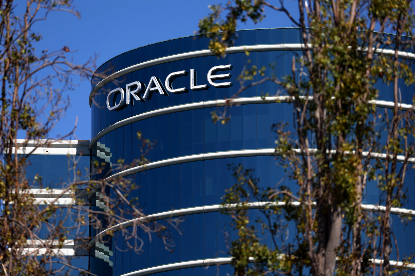 Stocks making the biggest moves midday: Oracle, Apple, Rentokil Initial and more