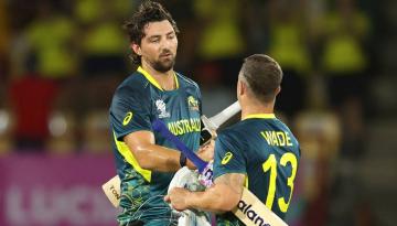 Cricket World Cup: Australia do champions England favour with victory over Scotland in weather-plagued group