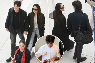 John Mulaney and Olivia Munn hold hands at airport after sparking marriage rumors